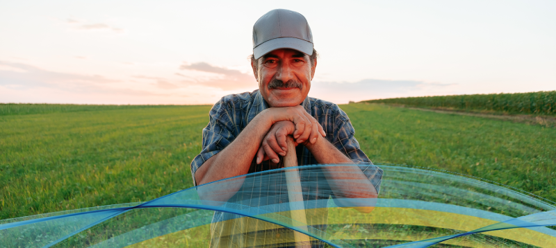 Stock image of distressed looking farmer ar the camera