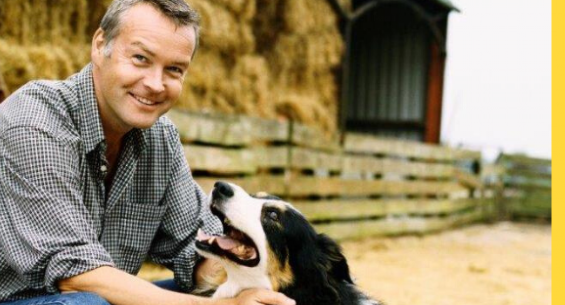 Image of farmer and his dog with PEI wordmark